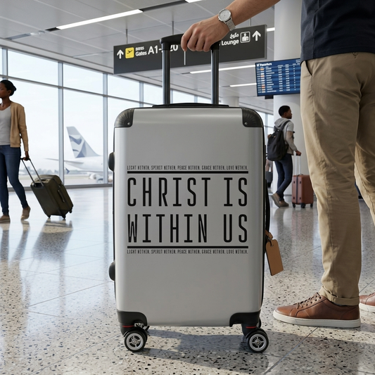 Suitcase with 'Christ is Within Us' text in an airport setting