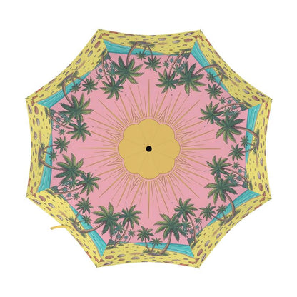Umbrella with palm tree and sun design on a pink background