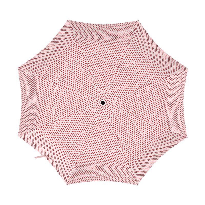 Pink polka dot umbrella on a white background