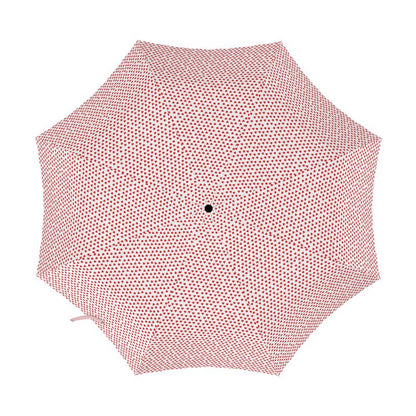 Pink polka dot umbrella on a white background