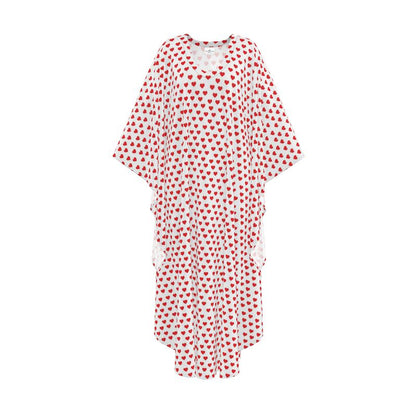 Red and white polka dot dress on a white background