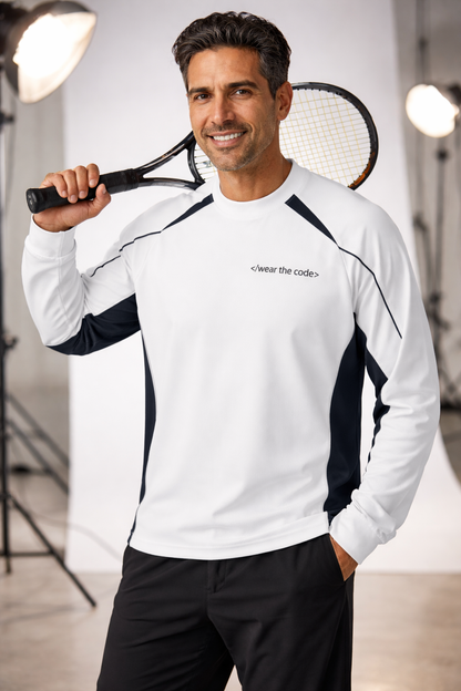 Man holding a tennis racket wearing a white and black athletic outfit with a visible brand logo.